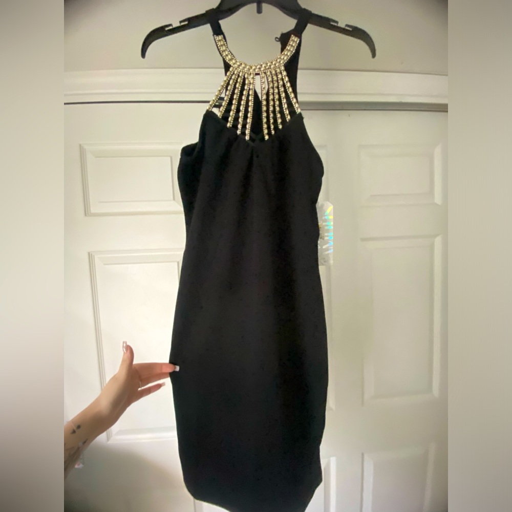 Gold halter top, Black mini dress